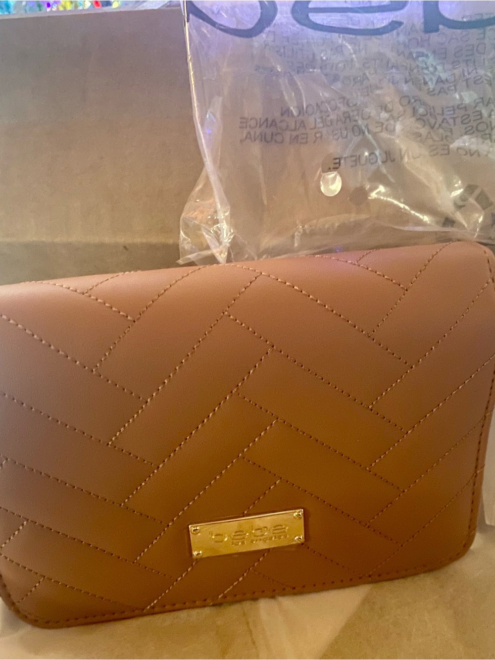 bebe Quilted Mauve Crossbody with Gold Plaque